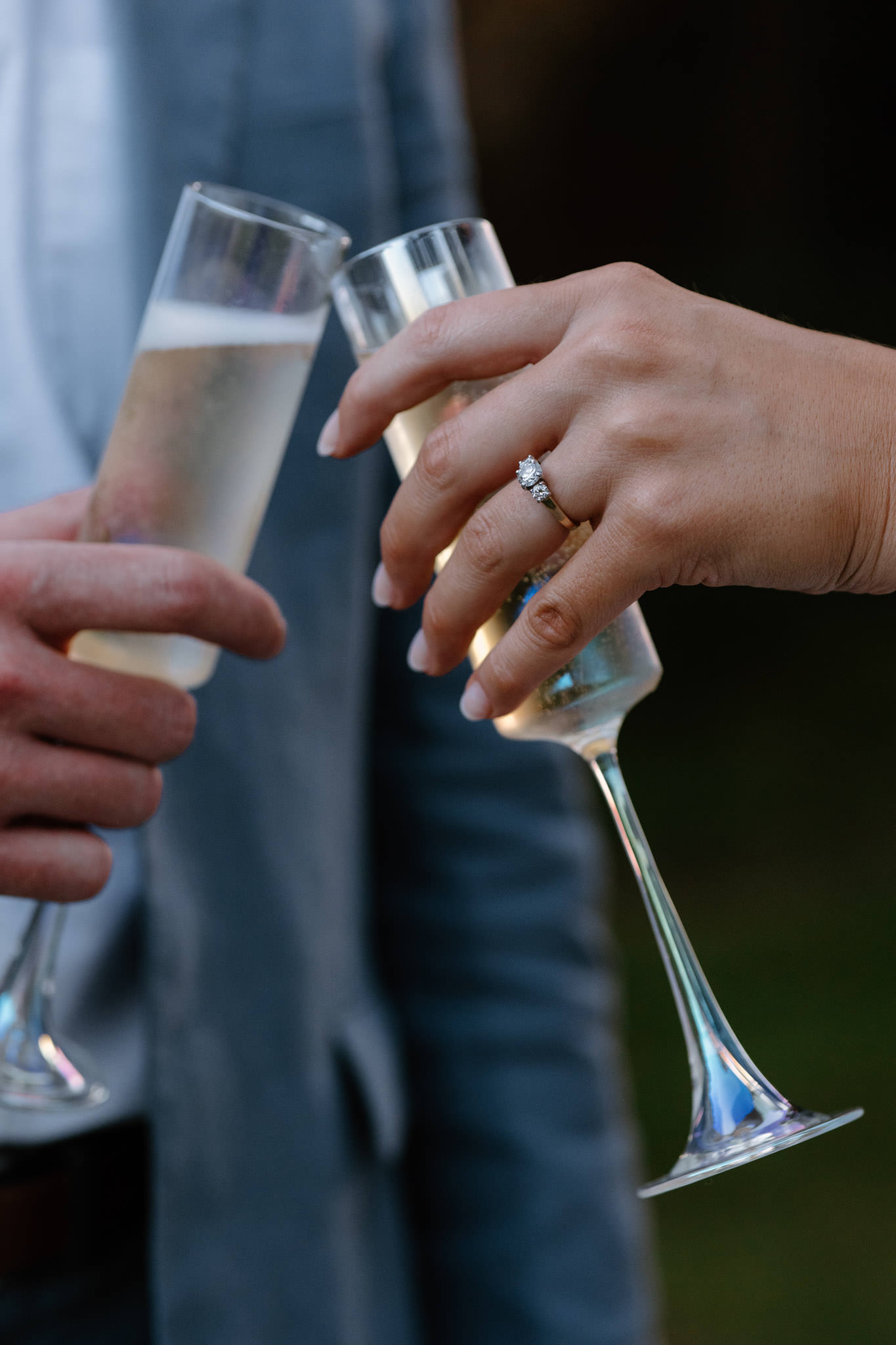 couple cheers champagne glasses at Bradley Estate Engagement Photos