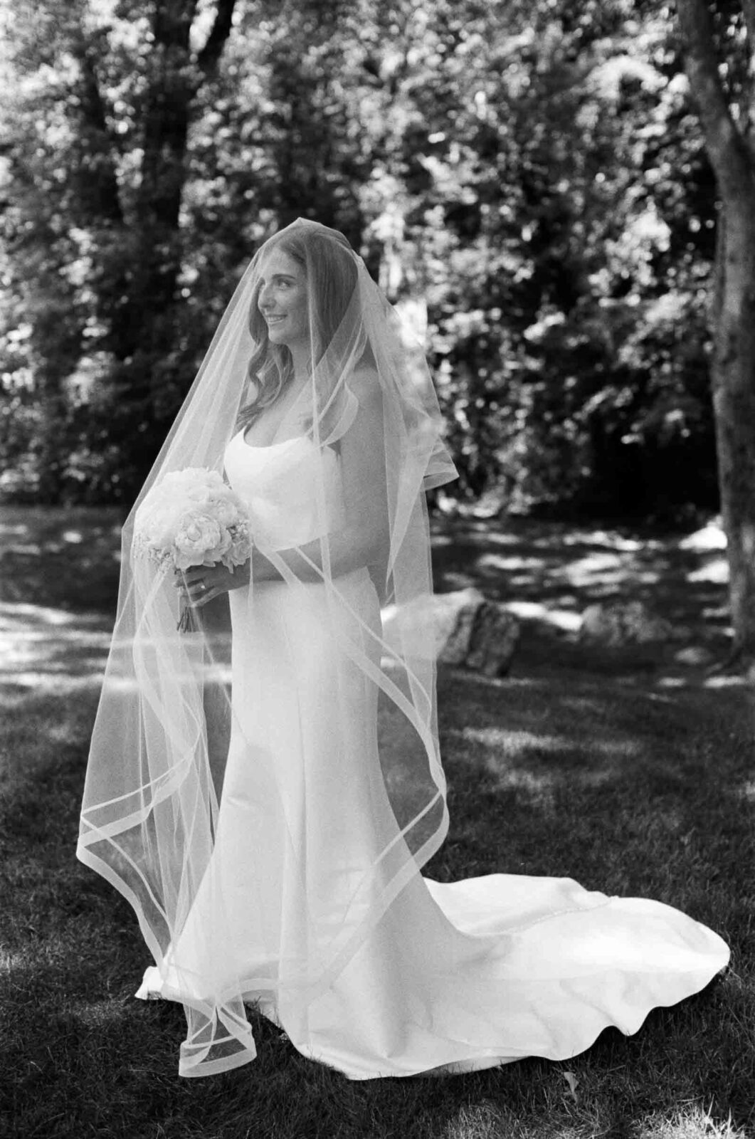 Black & White Film Photo of Bride on Wedding Day