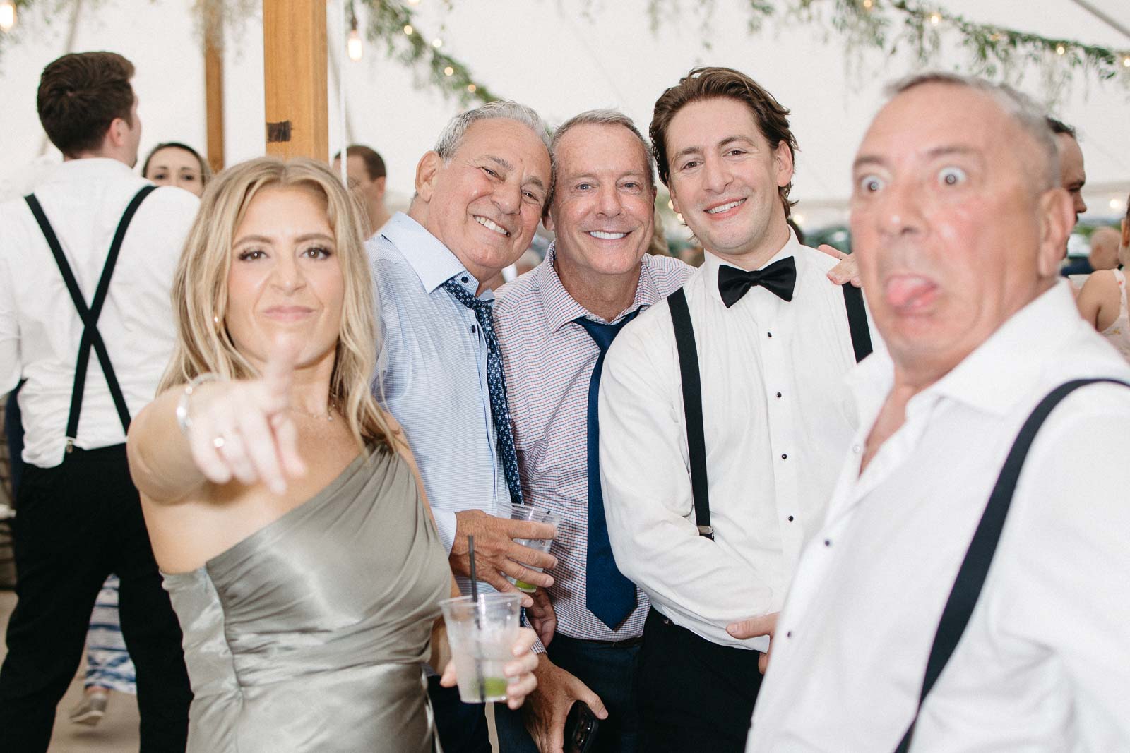 Family looks at the camera and smiles during the Westbrook Inn Wedding Reception