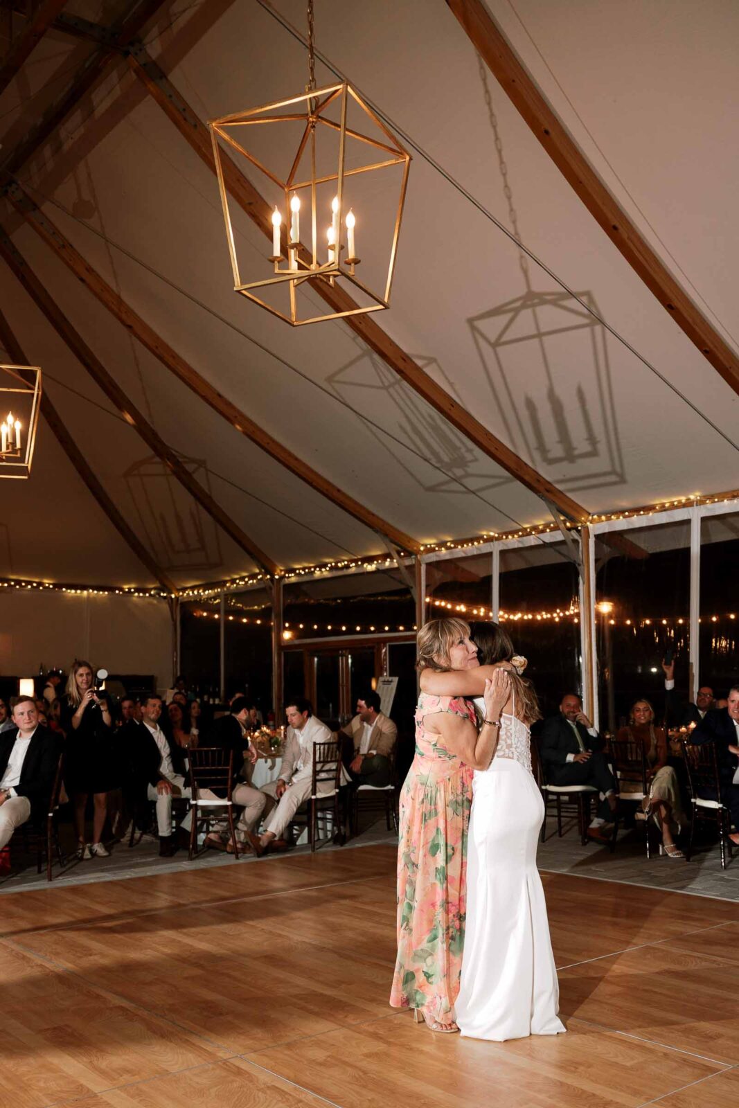 Mother daughter dance in a tented reception space at The Bohlin Wedding & Event Space