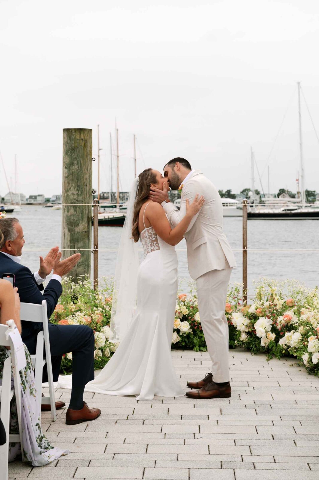 Sarah and Zach kiss for the first time as husband and wife at The Bohlin