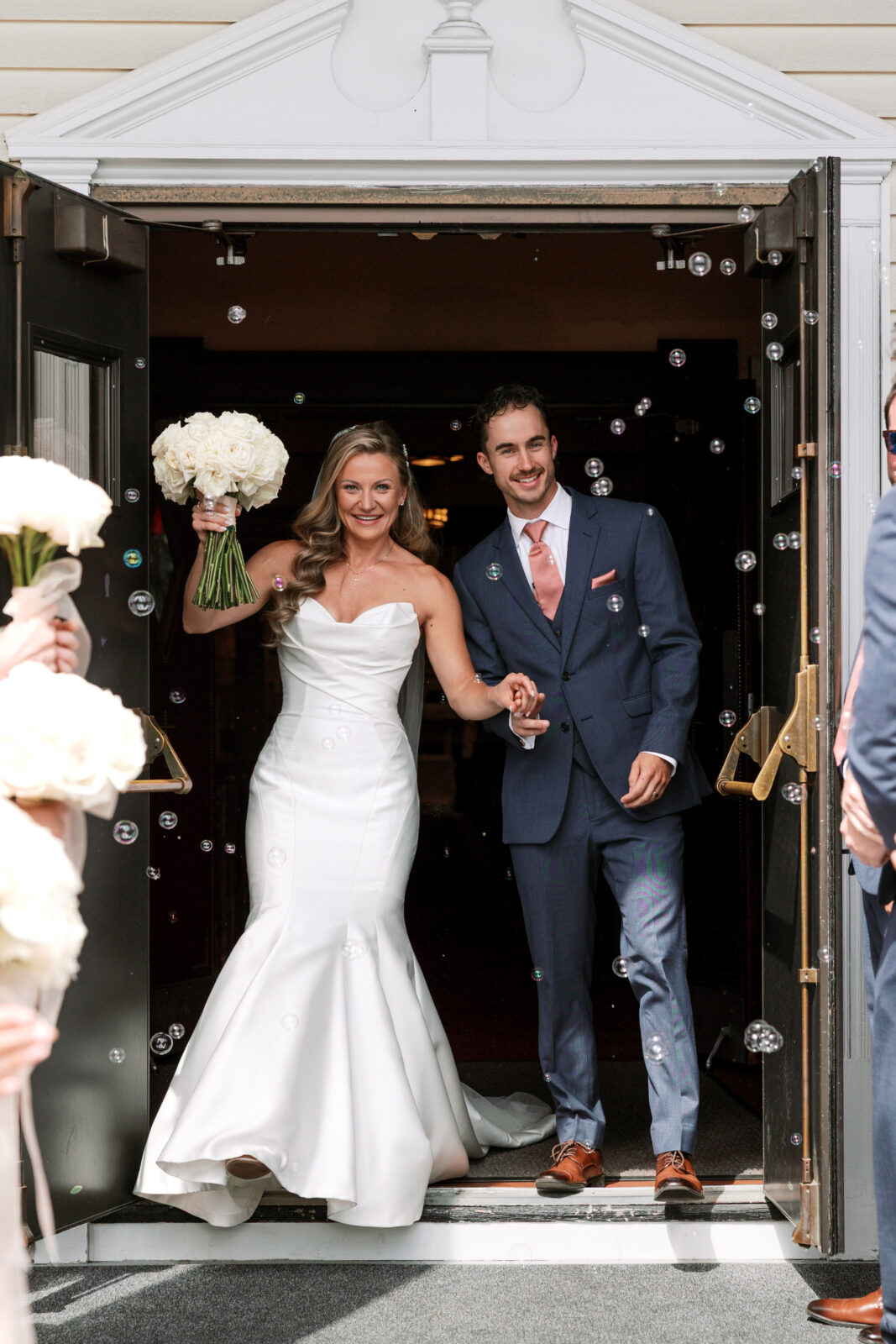 Bride & Groom exit the church as husband & wife | Grand View Mendon Wedding