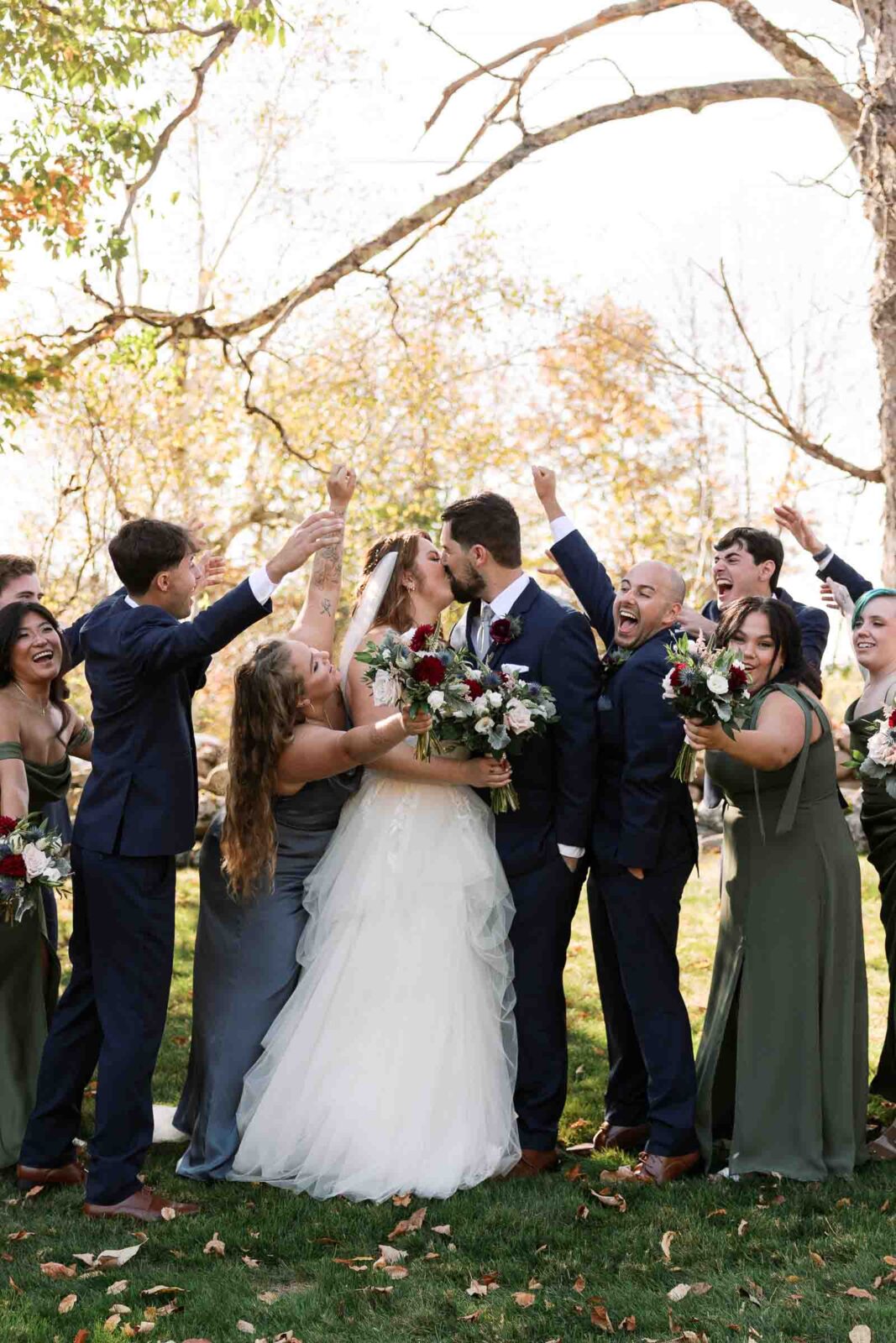 Wedding party celebrates bride and groom at Harrington Farm Wedding