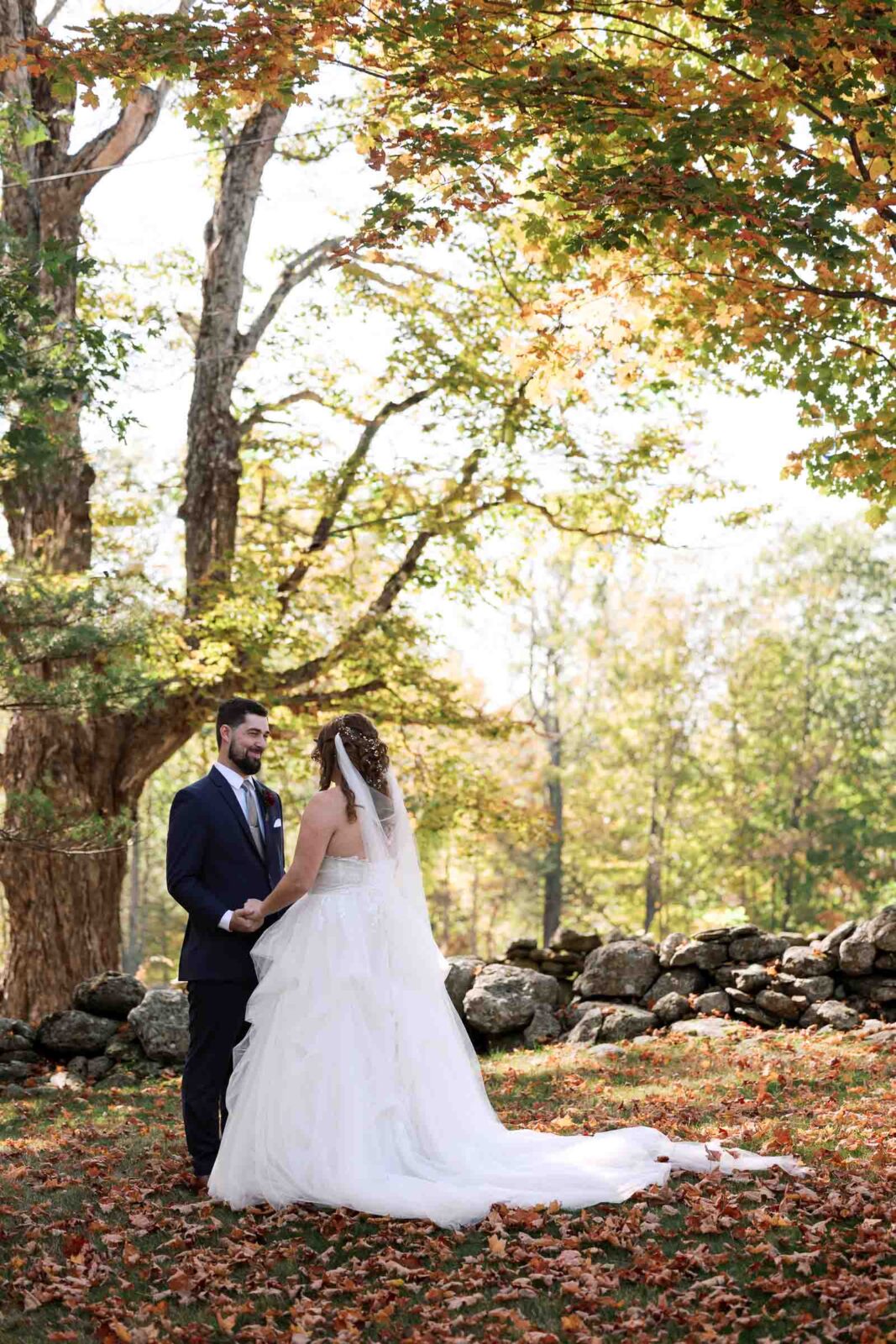 Bride and Groom share vows in beautiful fall foliage during First look at Harrington Farm Wedding