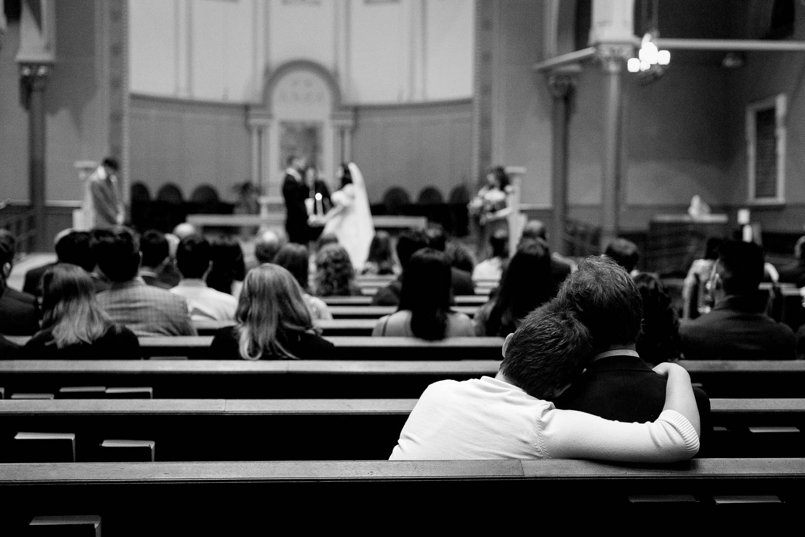 Friends watch bride and groom get married UMASS Club Wedding