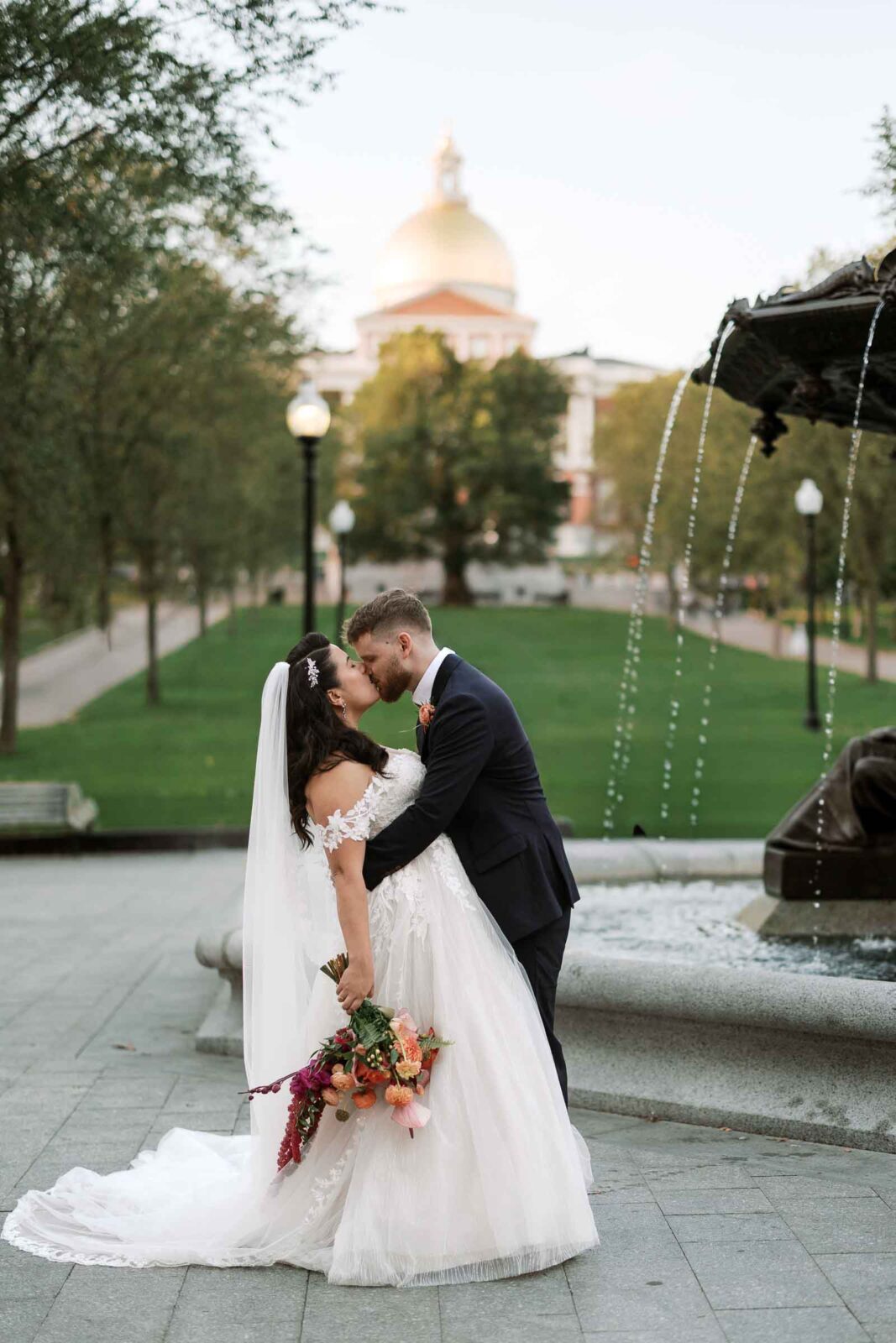 Bride & Groom Pose for Photo near Boston Common UMASS Club Wedding