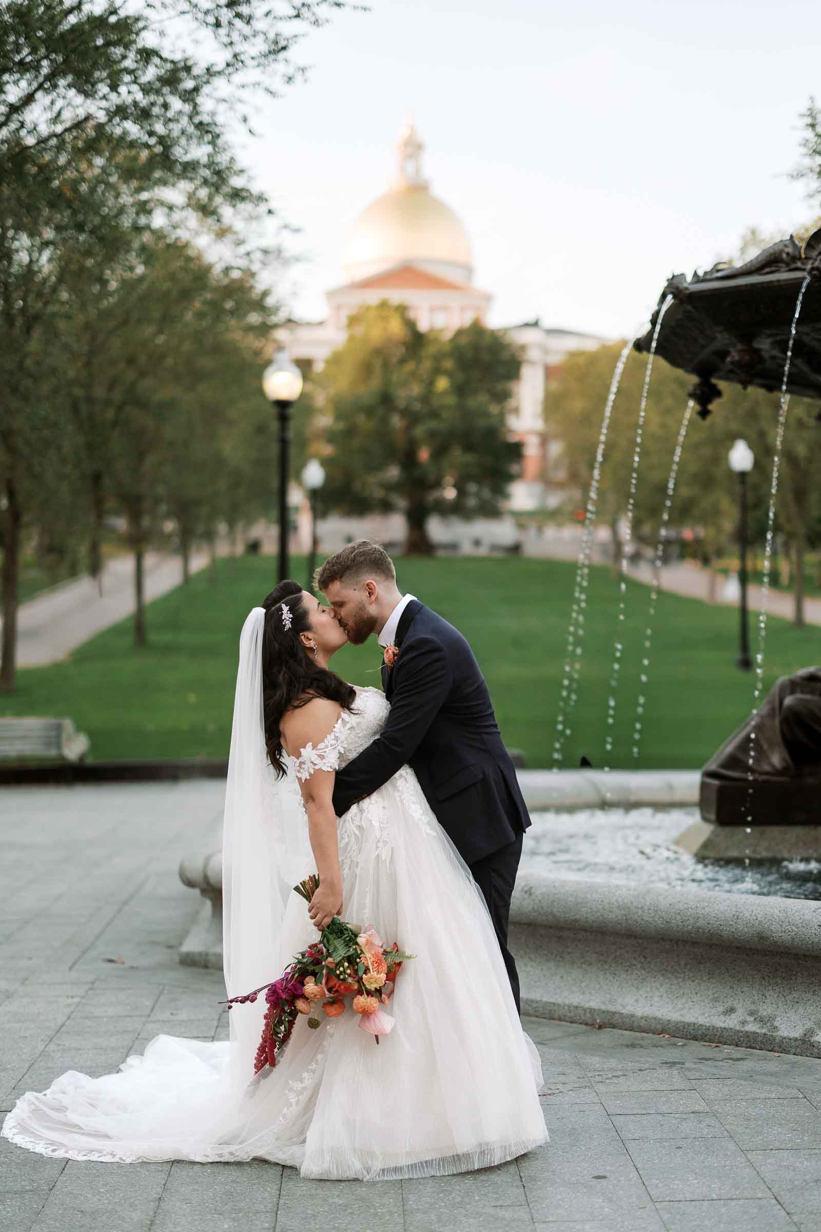 Bride & Groom Pose for Photo near Boston Common UMASS Club Wedding