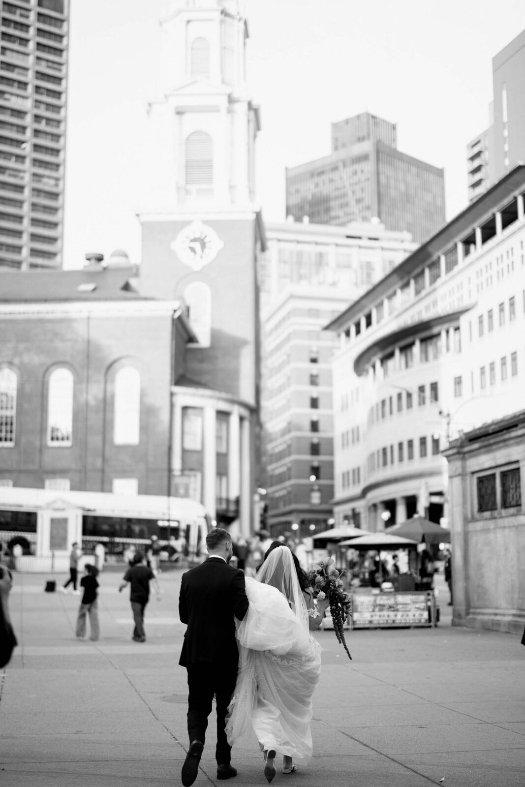 Bride & Groom Walk to UMASS Club Wedding Reception