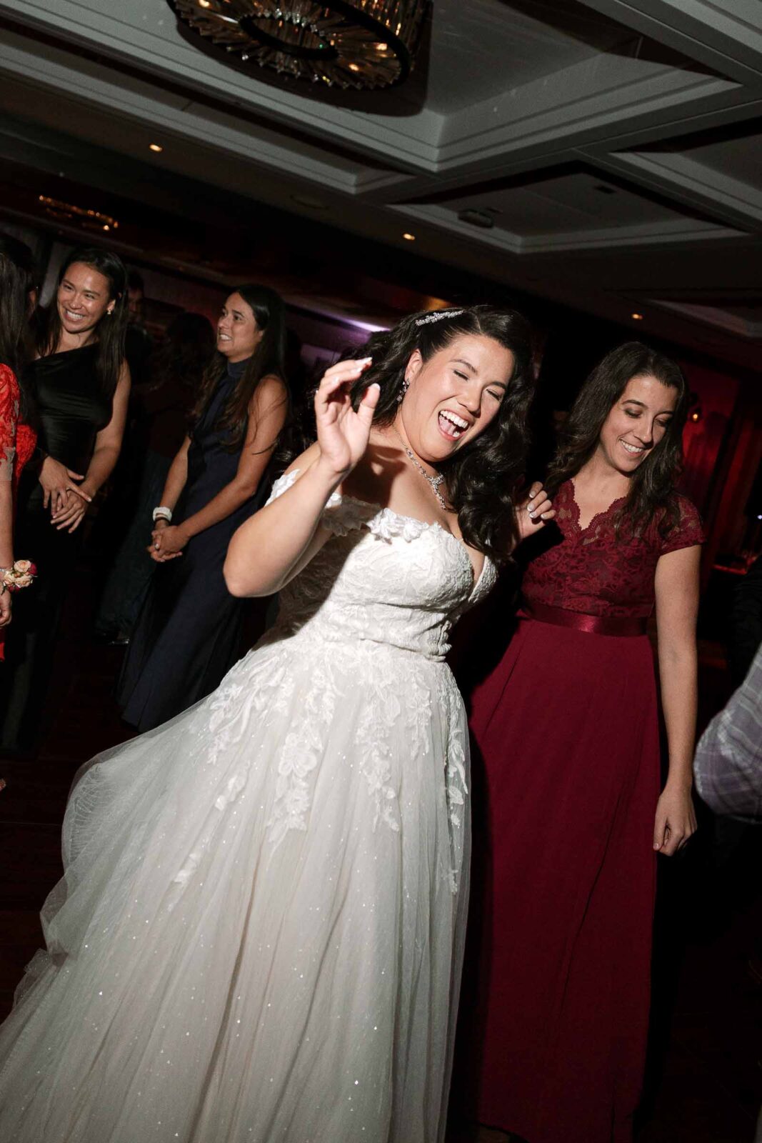 Bride dancing at the UMASS Club Boston Wedding Reception